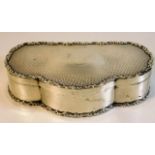 A scalloped front antique silver trinket box