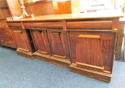 A 19thC. mahogany sideboard with four cupboards &