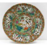 A 19thC. Cantonese porcelain charger, repaired 15i