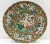 A 19thC. Cantonese porcelain charger, repaired 15i