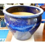 A large blue glazed planter 15in wide x 12.125in h