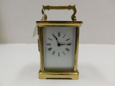 A brass carriage clock