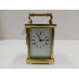 A brass carriage clock