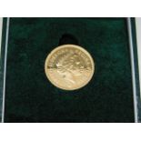 A cased 2014 full gold sovereign 7.9g
