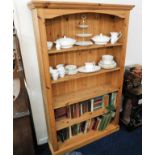 A modern solid pine bookcase 76in high x 44.25in w