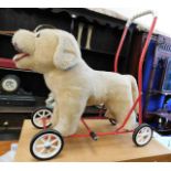 A Mulholland & Bailie childs push along dog toy