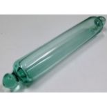 An antique glass rolling pin 1in long