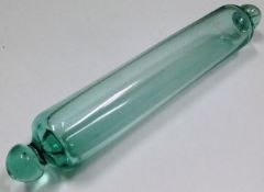 An antique glass rolling pin 1in long