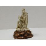 A Japanese carved ivory figure group set on organic plinth approx. 6.5in, signed to base