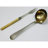 A 19thC. silver ladle with gilt bowl & bright cut