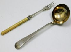 A 19thC. silver ladle with gilt bowl & bright cut