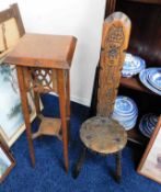 A carved spinning chair twinned with a decorative