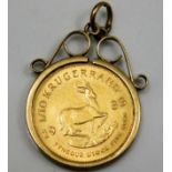 A 9ct gold mounted 1/10th Krugerrand coin 4.1g
