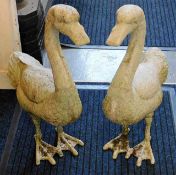 A pair of metal garden geese 25in high