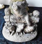 A stoneware pig & piglet group garden ornament 15i