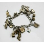 A silver charm bracelet 51.4g