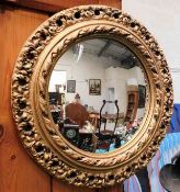 A gilt framed convex mirror 17in diameter