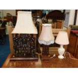 Two Oriental carved hardwood lamps twinned with one other, all PAT tested as pass