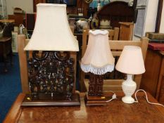 Two Oriental carved hardwood lamps twinned with one other, all PAT tested as pass