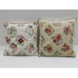 Two bespoke embroidered cushions by Miss. M. J. E.