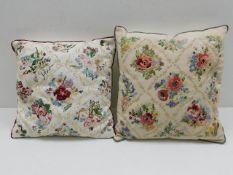 Two bespoke embroidered cushions by Miss. M. J. E.