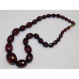 A set of cherry amber style faceted beads 50.5g