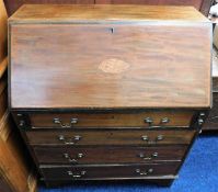 A mahogany bureau with inlaid decor