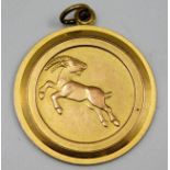 A 9ct gold Capricorn pendant 3.7g