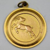 A 9ct gold Capricorn pendant 3.7g