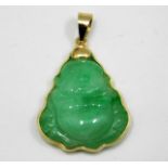 A carved buddha pendant mounted on 14ct gold 4.3g