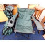 Two folding canvas style chairs twinned with a sma