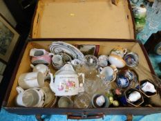 A suitcase full of mixed china & glassware