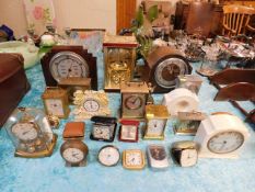 A quantity of mixed clocks including brass Bayard