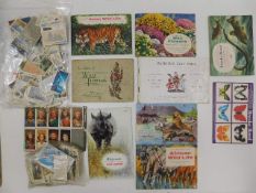 A quantity of tea & cigarette cards twinned with a