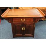 A Chinese hardwood altar cabinet with quality bras