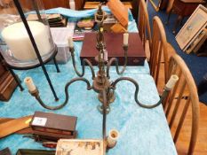 A brass five branch candelabra