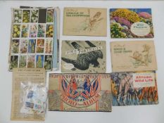 A quantity of tea & cigarette cards twinned with a