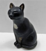 A stoneware cat doorstop 11in high