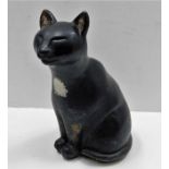 A stoneware cat doorstop 11in high