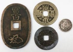 Four Chinese/Oriental coins