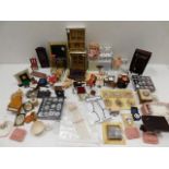 A boxed quantity of dolls house furniture & furnis