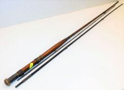 A vintage three piece cane fishing rod twinned with a c.1880 Lydon framed print of a Chubb
