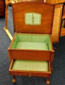 A mahogany work box with silk like lining