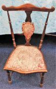 A small antique childs chair