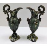 A pair of German majolica ewers 7.75in tall