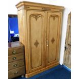 A decorative Victorian compactum wardrobe with int