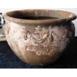 A large terracotta garden pot 20in wide x 14in hig