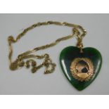 A 9ct gold mounted New Zealand jade pendant 17g in