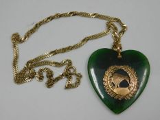 A 9ct gold mounted New Zealand jade pendant 17g in