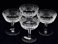 Four Irish Waterford crystal glasses, one with ver